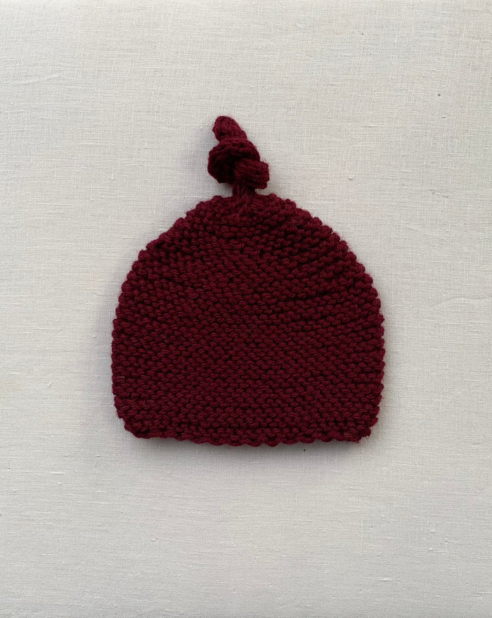 Knitted by Nana Top Knot Beanie - Sangria