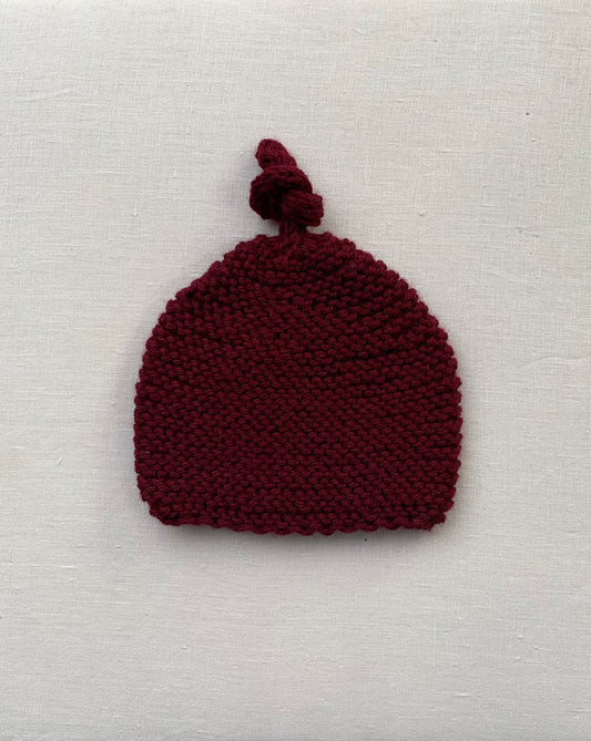 Knitted by Nana Top Knot Beanie - Sangria