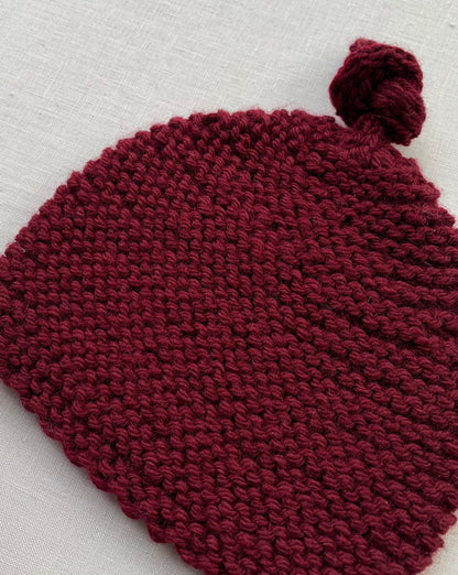 Knitted by Nana Top Knot Beanie - Sangria