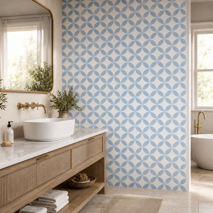 Penta Dahlia Alice Blue MS 31.1 x 31.1cm mosaic sheet featuring a soft blue and white floral geometric pattern, creating a bright contemporary bathroom feature wall.